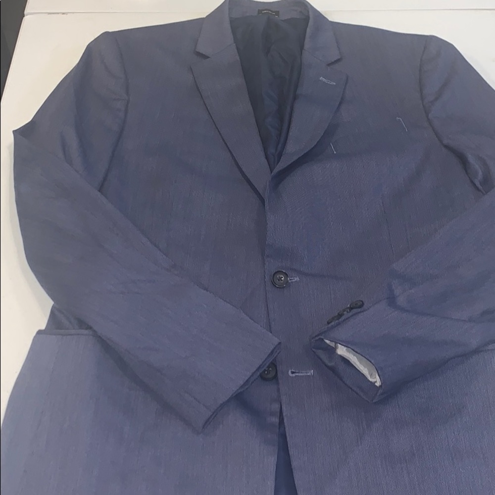 A sports coat. Navy blue. Very chic.
